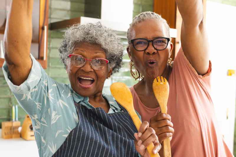 women cheering at cooking party